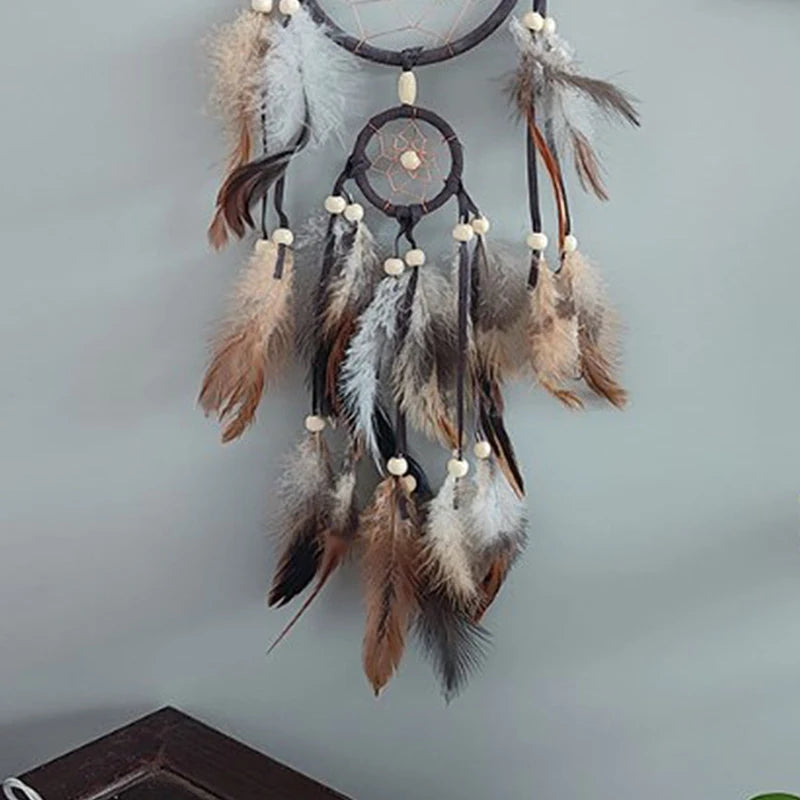 décoration murale attrape rêves traditionnel plumes naturelles raphia noir bleu beige