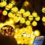 guirlandes lumineuses solaires led jaune orangé boules rondes patio jardin decoration nocturne modes auto