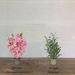 décoration intérieure plante artificielle fleurs feuilles moderne rose blanche verte salon