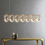 suspension lumineuse moderne or anneaux pendentif led table chambre salon restaurant lumière maison