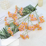 décoration intérieure bouquet fleurs artificielles soie marguerites jaunes blancs vases abstraits