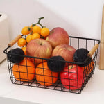 Panier de rangement métal noir sur bureau organisé