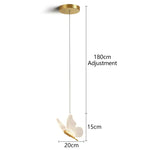 suspension lumineuse moderne or papillons effet lumineux diffus trois têtes