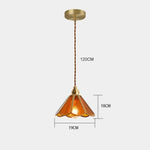 suspension lumineuse verre teinté art deco or marron bleu clair motifs géométriques opacité chaînes