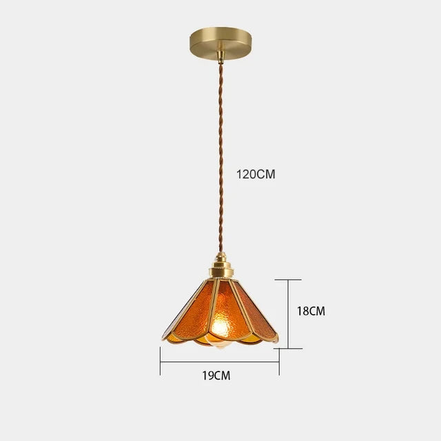 suspension lumineuse verre teinté art deco or marron bleu clair motifs géométriques opacité chaînes