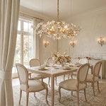 lustre suspendu classique doré blanc fleurs stylisées 160cm 180cm 200cm lumière chaude neutre lumière
