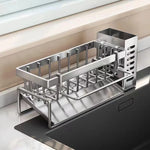 rangement évier acier inoxydable éponge savon bouteilles détergent moderne minimaliste