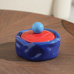 cendrier céramique rouge jaune bleu texture ondulée moderne salon