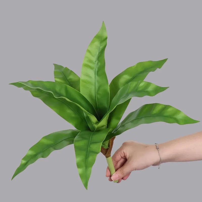 décoration intérieure plante artificielle feuilles larges moderne pot verre ordinateur vert végétal soft rubber