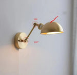 lampe murale industrielle dorée lisse fixée mur interrupteur câble électrique moderne cuisine chambre