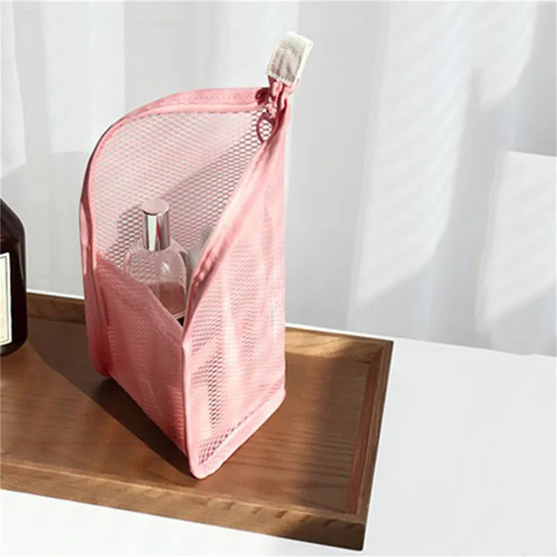sac toilette voyage transparent rose gris blanc maille minimaliste elastiques brosse dents dentifrice maquillage