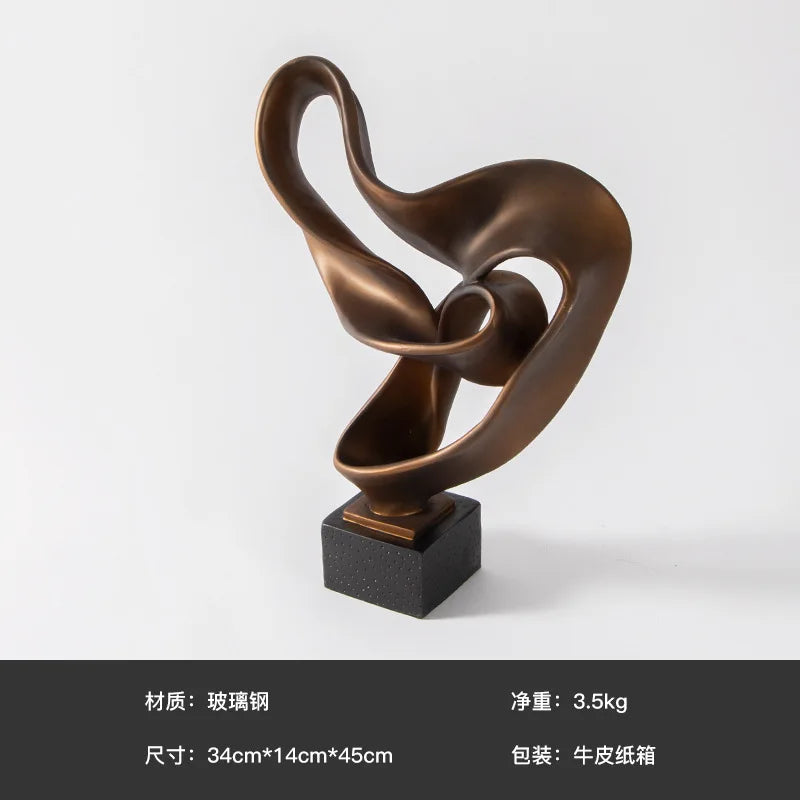 Sculpture abstraite en résine bronze sur une étagère