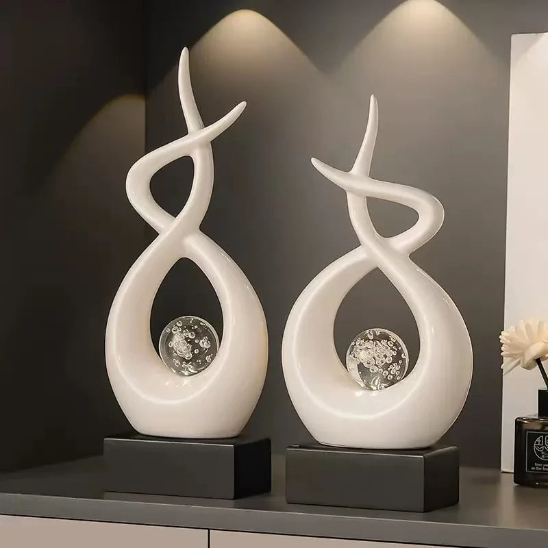sculptures décoratives modernes résine transparente bulles inclusion blanc argenté base noire minimaliste