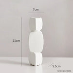 vases decoratifs modernes minimalistes geometriques blanc noir sculpturauxbranches feuillageintérieur decoration