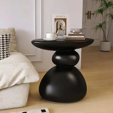 table d'appoint moderne table basse résine couleur noir marron clair blanc cassé sculptural salon