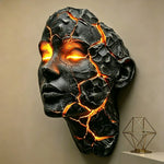 masque sculptural noir orange texture craquelée effet lave art contemporain sans fixation visible