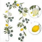 guirlande fleurs artificielles feuilles vertes citrons jaunes fleurs blanches naturel rustique decoration intérieure fête