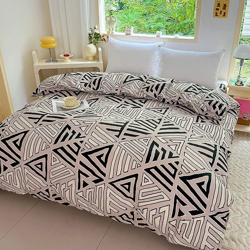 housse couette géométrique triangles beige noir blanche moderne minimaliste chambre lit