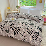 housse couette géométrique triangles beige noir blanche moderne minimaliste chambre lit
