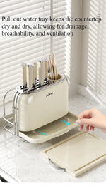 Détail du rangement couteaux et baguettes en acier inoxydable