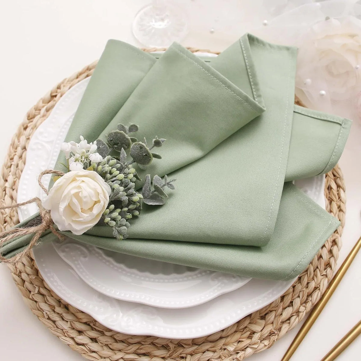 serviettes table vert pastel rose pâle beige clair motif uni classique élégant nœud fleur