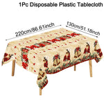 nappe table noël cloches dorées fleurs rouges feuilles vertes guirlandes flocons dorés classique