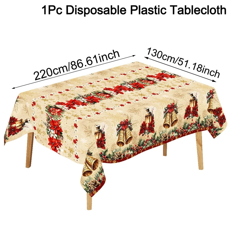 nappe table noël cloches dorées fleurs rouges feuilles vertes guirlandes flocons dorés classique