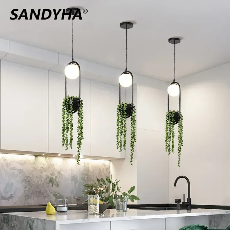 suspension végétale moderne plante artificielle lumière sphère lumineuse noir blanc vert minimaliste