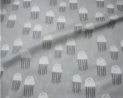 tissu coton imprimé thème marin poissons coquillages enfants blanc rose bleuclair vert