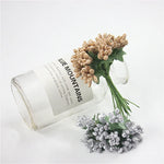 décoration intérieure bouquets artificiels fleurs boutons modernes variées feuilles vertes
