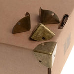protections d'angle bronze vieilli 16 pièces fixations texturées industriel vintage