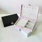 boîte bijoux simili cuir noir blanc rose compartiments cadenas classique organisation sécurité
