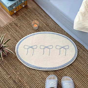 tapis ovale moderne motif rubans étoiles texture douce beige clair bleu pastel résistant décoloration