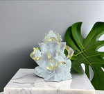 statue ganesha blanc détails dorés motif sculpté occasion mariage décoration intérieure traditionnelle hindoue