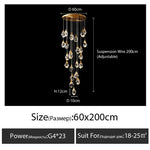 suspension lumineuse moderne transparente dorée facettes géométriques élégante leds