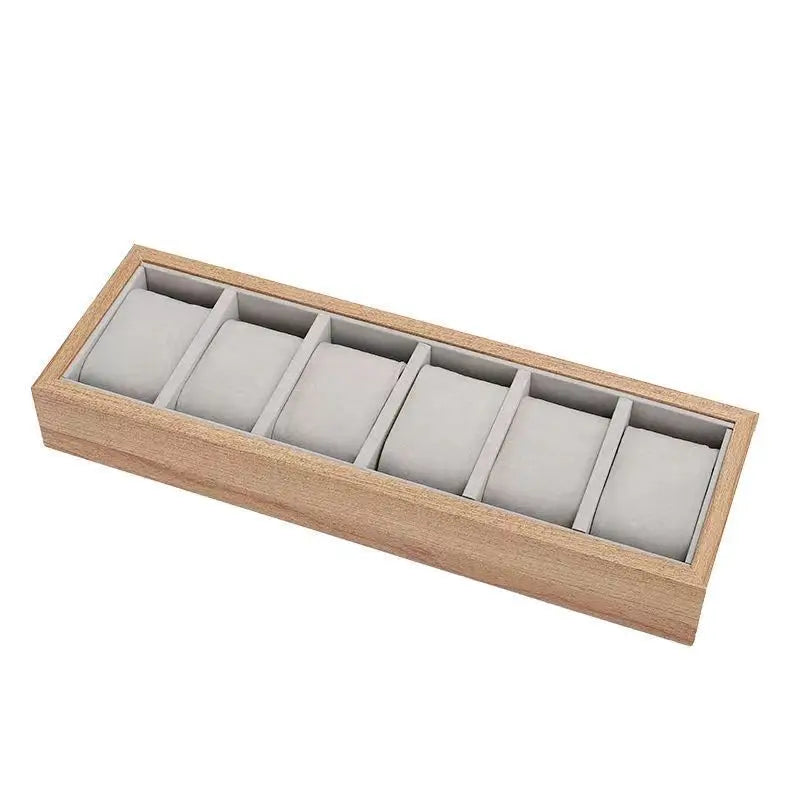 boîte montres marron clair compartiments verre transparent aspect bois moderne poignée métalliqueSlots 75cm31cm12cm