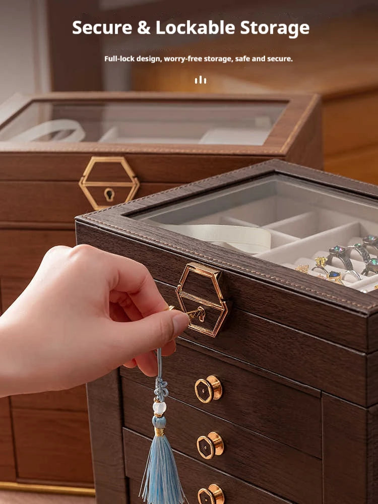 boîte bijoux multi niveaux marron foncé grain bois verre transparent poignées dorées élégante rangement