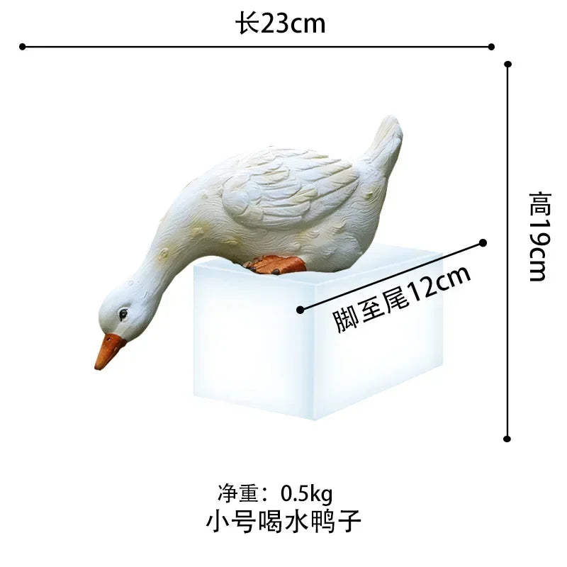 statue canard blanc plumes orange piscine jardin décoration extérieure animaux ornements paysagistes fleurs artificielles