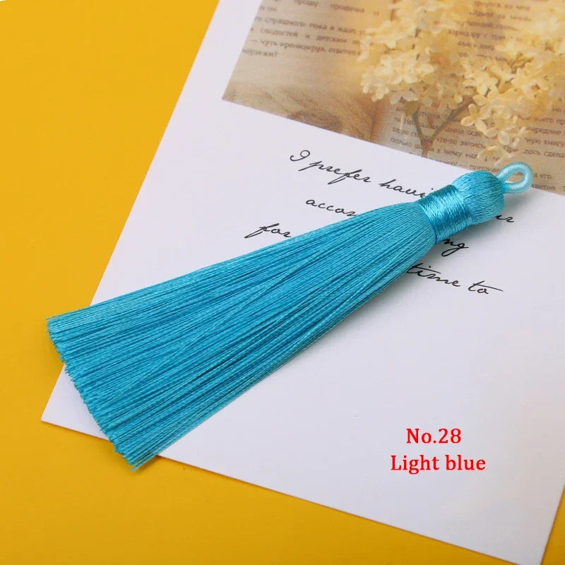 lot dix pompons soyeux anneau métallique décoration rideau couture bijoux artisanat