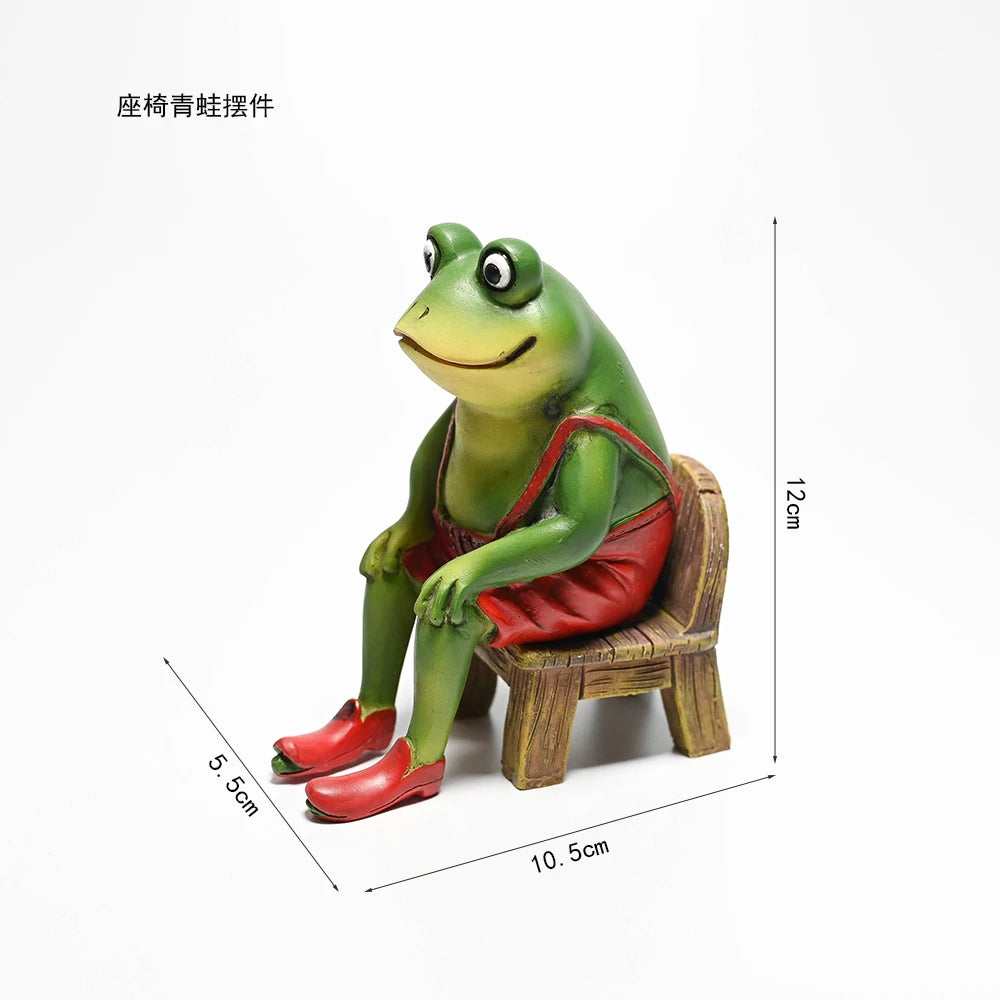 statue grenouille verte banc bois grenouille chaussures rouges deco jardin pastel fantaisiste