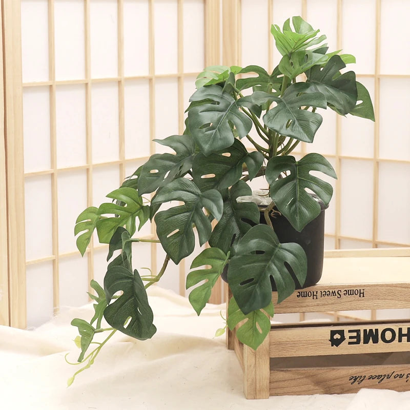 plantes artificielles feuilles vertes perforées moderne intérieur décoration maison pot bois