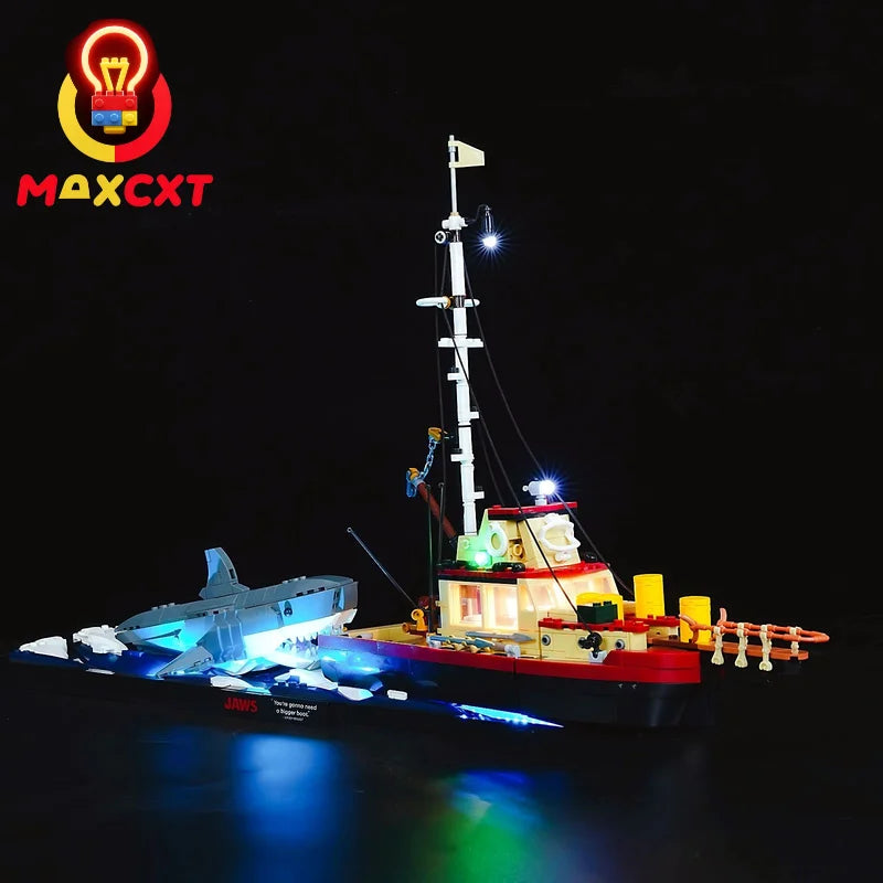 bateau pêche lego rouge blanc bleu détails métalliques hublots cordages