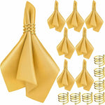 serviettes pliées serviettes satin noir or bleu roi classiques anneaux dorés table