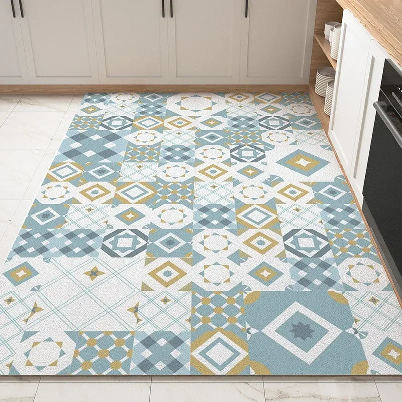 Tapis aux motifs géométriques dans des tons de bleu, de jaune et de blanc, créant un motif harmonieux sur le sol de la cuisine.
