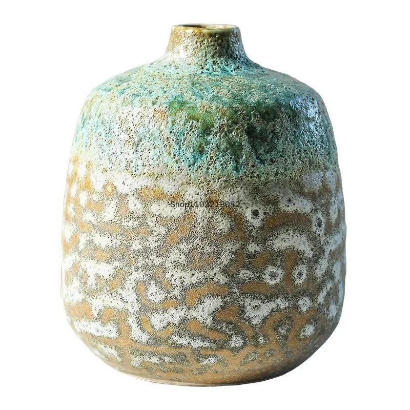 vase céramique rustique vert beige marron texturé variations couleur branches feuilles arrangement floral