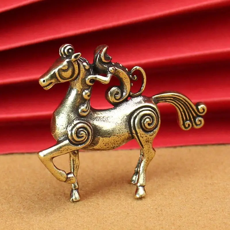 statuette équestre métal doré bronze motifs gravés antique décoratif miniature