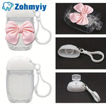 flacon gel hydroalcoolique transparent rose ruban noeud clip moderne rechargeableextérieur