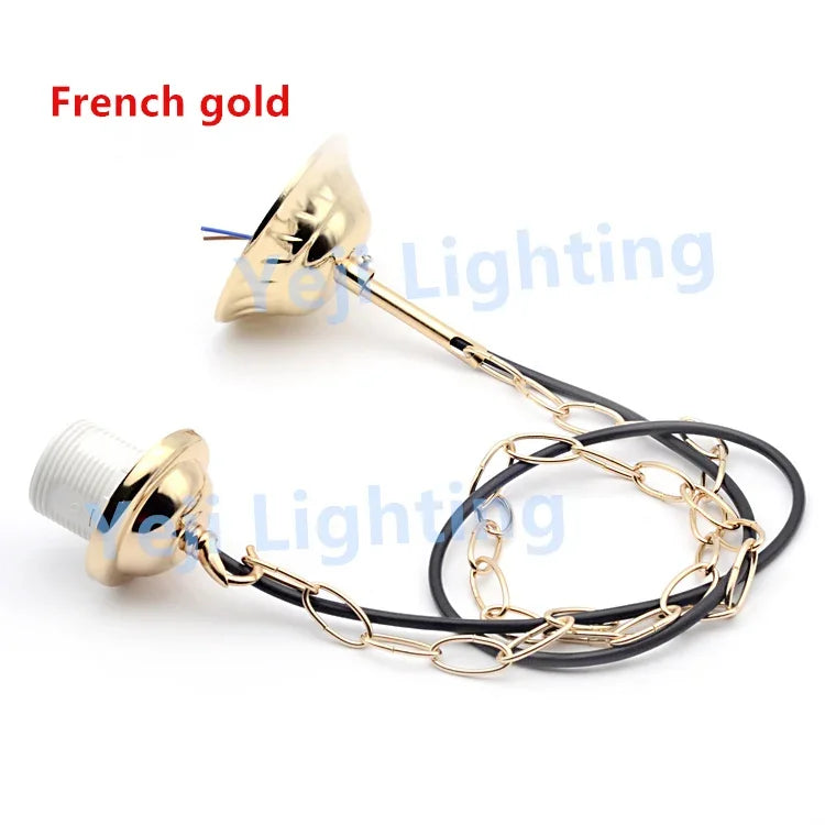 suspension lumineuse moderne élégante chaînes métalliques câble noir vis écrous bronze vert
