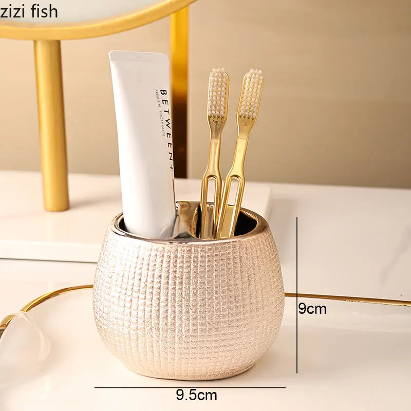 ensemble salle bain moderne or pâle brosse dents savon tube crème blanche distributeur