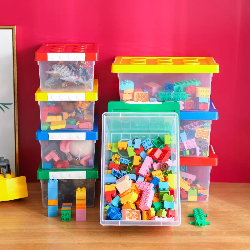 boîtes rangement transparentes couleurs poignées plaques construction moderne organisation jouets articles divers empilage support